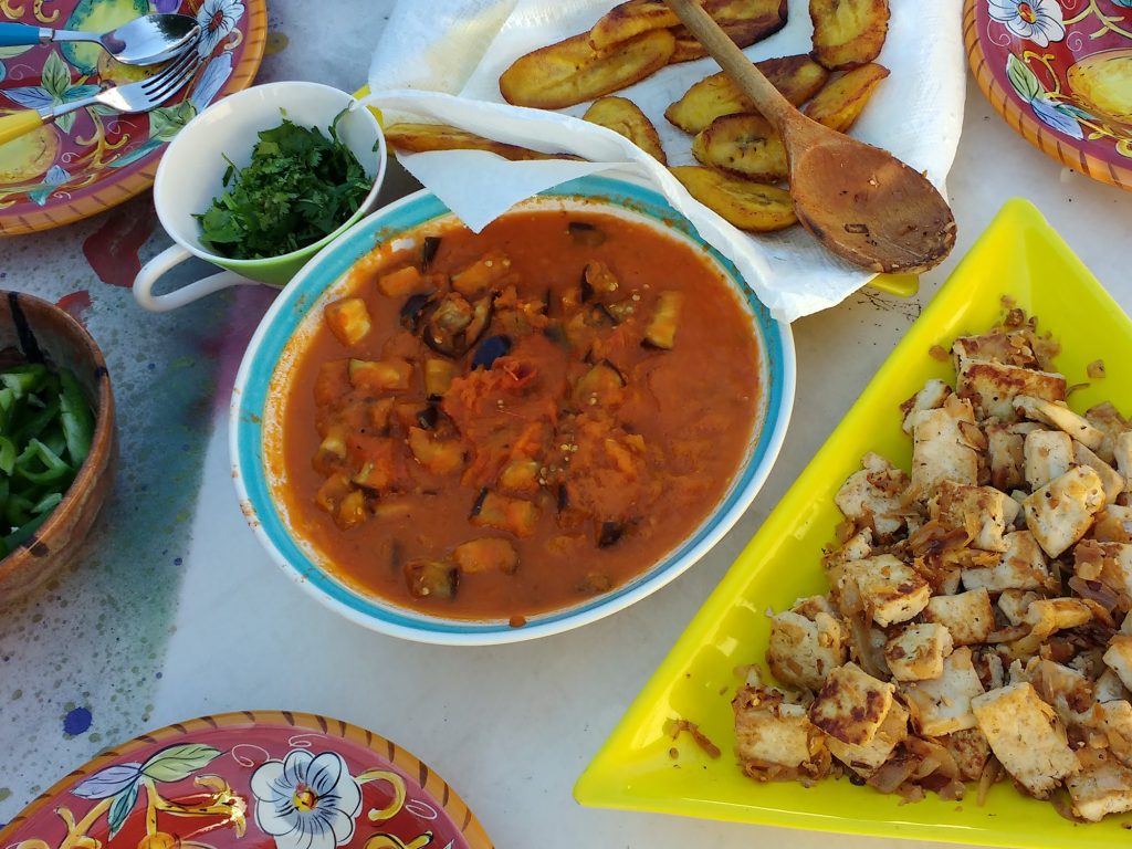 Close-up of dishes of food at an outdoor table