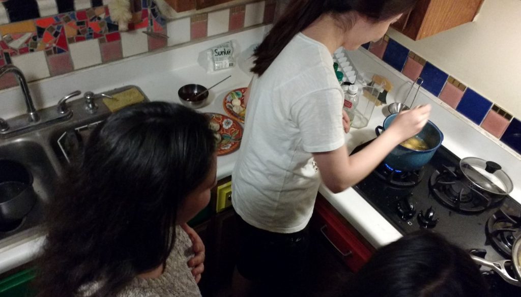 Soojeen frying the donuts!