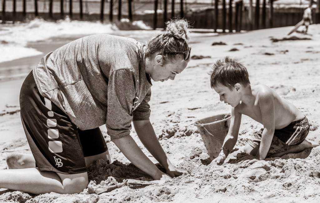 working with sand at the shoreline