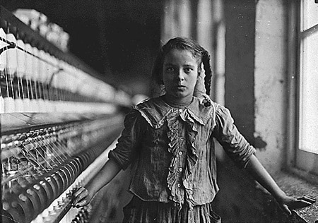 Lewis Hine photo of a child working in a factory
