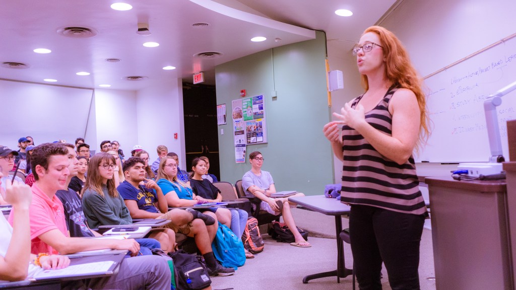 Kandis Pogoda speaking to the students of Art 110 in room Psy-150