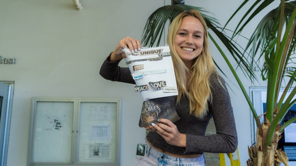 photo of Julia Hietke holding a concrete poem